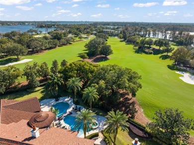 Welcome to this grand residence nestled on a sprawling 1.17 acre on Isleworth Golf and Country Club in Florida - for sale on GolfHomes.com, golf home, golf lot