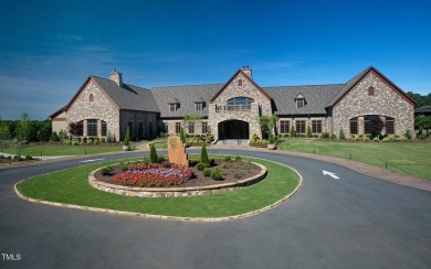 Nestled in the prestigious Hasentree Country Club community on Hasentree Club in North Carolina - for sale on GolfHomes.com, golf home, golf lot