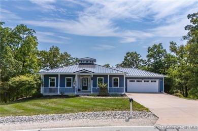 This charming Craftsman-style home, nestled in a prime location on Tan-Tar-A Golf Club in Missouri - for sale on GolfHomes.com, golf home, golf lot