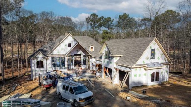 Introducing a New Construction luxurious custom home nestled in on Reynolds Lake Oconee - The Oconee in Georgia - for sale on GolfHomes.com, golf home, golf lot