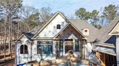 Introducing a New Construction luxurious custom home nestled in on Reynolds Lake Oconee - The Oconee in Georgia - for sale on GolfHomes.com, golf home, golf lot