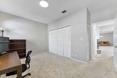 Step through the double-door entry into this stunning 2nd-floor on Boca Pointe Country Club in Florida - for sale on GolfHomes.com, golf home, golf lot