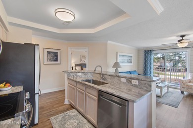 Spotless in every way and ready for immediate delivery, this on Brunswick Plantation and Golf Resorts in North Carolina - for sale on GolfHomes.com, golf home, golf lot