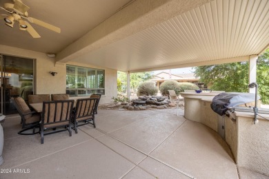 Welcome to this stunning, expanded Hacienda model home featuring on Sun City Grand Golf Couse and Club in Arizona - for sale on GolfHomes.com, golf home, golf lot