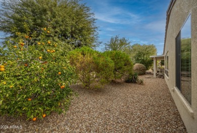 Welcome to this stunning, expanded Hacienda model home featuring on Sun City Grand Golf Couse and Club in Arizona - for sale on GolfHomes.com, golf home, golf lot