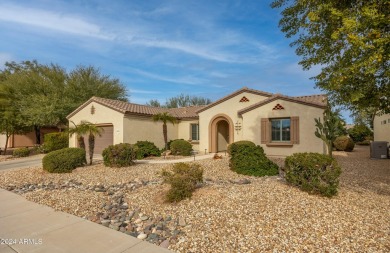 Welcome to this stunning, expanded Hacienda model home featuring on Sun City Grand Golf Couse and Club in Arizona - for sale on GolfHomes.com, golf home, golf lot