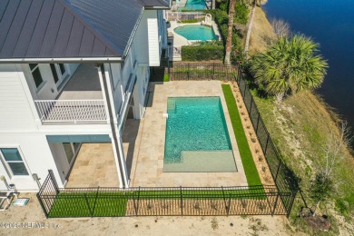 Step into this breathtaking new construction home that blends on The Ocean Course At Hammock Beach Resort in Florida - for sale on GolfHomes.com, golf home, golf lot