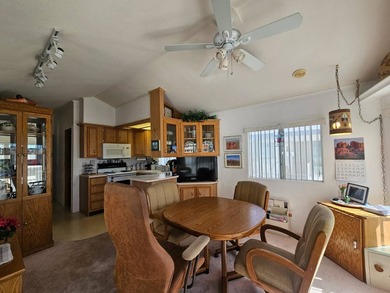 Situated in the vibrant Viewpoint Golf Resort 55+ community on Viewpoint Golf Resort in Arizona - for sale on GolfHomes.com, golf home, golf lot