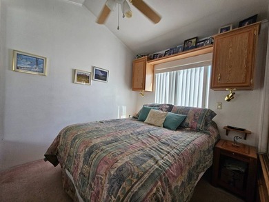 Situated in the vibrant Viewpoint Golf Resort 55+ community on Viewpoint Golf Resort in Arizona - for sale on GolfHomes.com, golf home, golf lot