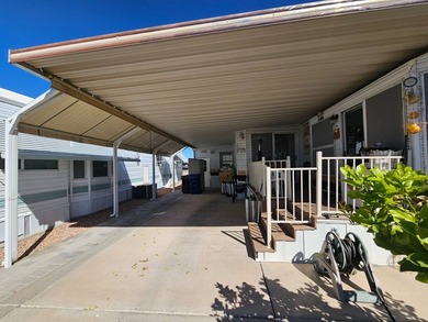 Situated in the vibrant Viewpoint Golf Resort 55+ community on Viewpoint Golf Resort in Arizona - for sale on GolfHomes.com, golf home, golf lot