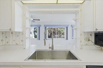 One or more photo(s) has been virtually staged. Welcome to 10197 on Mainlands Golf Club in Florida - for sale on GolfHomes.com, golf home, golf lot