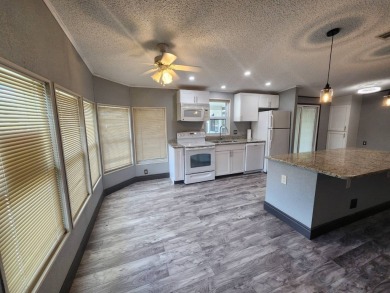 WELCOME HOME! You have found your dream retirement home in the on Golden Lakes Golf Course in Florida - for sale on GolfHomes.com, golf home, golf lot
