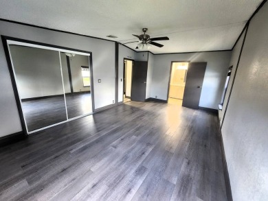WELCOME HOME! You have found your dream retirement home in the on Golden Lakes Golf Course in Florida - for sale on GolfHomes.com, golf home, golf lot
