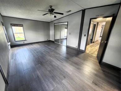 WELCOME HOME! You have found your dream retirement home in the on Golden Lakes Golf Course in Florida - for sale on GolfHomes.com, golf home, golf lot