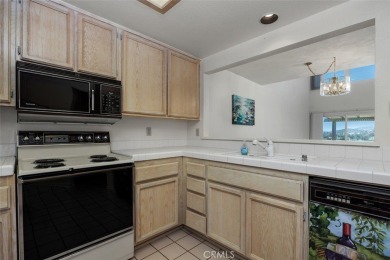 This AMAZING LAKE VIEW TOWNHOME in The Colony at Lake San Marcos on Lake San Marcos Country Club- North Course in California - for sale on GolfHomes.com, golf home, golf lot