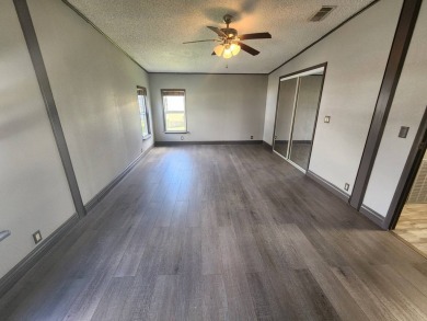 WELCOME HOME! You have found your dream retirement home in the on Golden Lakes Golf Course in Florida - for sale on GolfHomes.com, golf home, golf lot