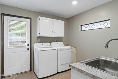 Discover serenity and style in this beautifully renovated, truly on Brierwood Golf Club in North Carolina - for sale on GolfHomes.com, golf home, golf lot