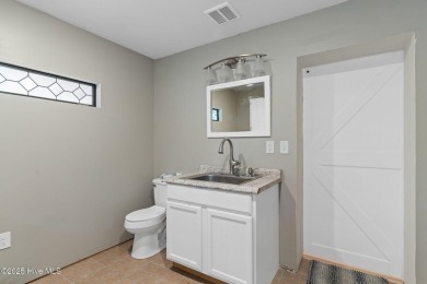 Discover serenity and style in this beautifully renovated, truly on Brierwood Golf Club in North Carolina - for sale on GolfHomes.com, golf home, golf lot