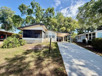 Home is located in Water Oak Country Club Estates in Lady Lake on Water Oak Country Club Estates in Florida - for sale on GolfHomes.com, golf home, golf lot