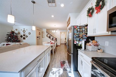 This beautifully maintained 3-bedroom, 2.5-bathroom townhome on ChampionsGate Golf Resort in Florida - for sale on GolfHomes.com, golf home, golf lot