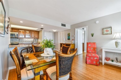 TURNKEY with GOLF & WATERFRONT VIEWS -- This beautifully on Isla Del Sol Yacht and Country Club in Florida - for sale on GolfHomes.com, golf home, golf lot