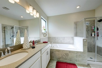 This beautifully maintained 3-bedroom, 2.5-bathroom townhome on ChampionsGate Golf Resort in Florida - for sale on GolfHomes.com, golf home, golf lot