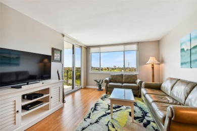 TURNKEY with GOLF & WATERFRONT VIEWS -- This beautifully on Isla Del Sol Yacht and Country Club in Florida - for sale on GolfHomes.com, golf home, golf lot