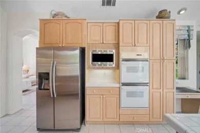 Meticulously maintained single-level home with no interior steps on El Niguel Country Club in California - for sale on GolfHomes.com, golf home, golf lot