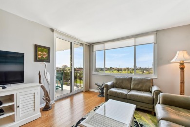 TURNKEY with GOLF & WATERFRONT VIEWS -- This beautifully on Isla Del Sol Yacht and Country Club in Florida - for sale on GolfHomes.com, golf home, golf lot