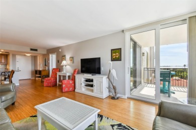 TURNKEY with GOLF & WATERFRONT VIEWS -- This beautifully on Isla Del Sol Yacht and Country Club in Florida - for sale on GolfHomes.com, golf home, golf lot