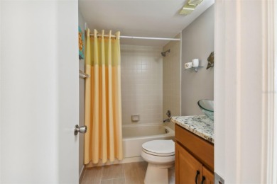TURNKEY with GOLF & WATERFRONT VIEWS -- This beautifully on Isla Del Sol Yacht and Country Club in Florida - for sale on GolfHomes.com, golf home, golf lot