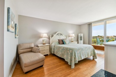 TURNKEY with GOLF & WATERFRONT VIEWS -- This beautifully on Isla Del Sol Yacht and Country Club in Florida - for sale on GolfHomes.com, golf home, golf lot