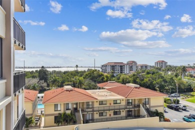 TURNKEY with GOLF & WATERFRONT VIEWS -- This beautifully on Isla Del Sol Yacht and Country Club in Florida - for sale on GolfHomes.com, golf home, golf lot