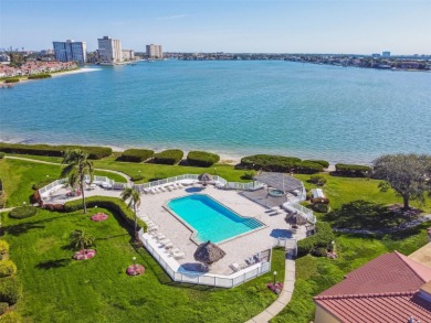 TURNKEY with GOLF & WATERFRONT VIEWS -- This beautifully on Isla Del Sol Yacht and Country Club in Florida - for sale on GolfHomes.com, golf home, golf lot