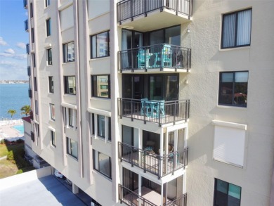 TURNKEY with GOLF & WATERFRONT VIEWS -- This beautifully on Isla Del Sol Yacht and Country Club in Florida - for sale on GolfHomes.com, golf home, golf lot