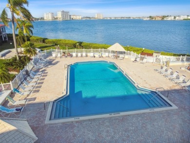 TURNKEY with GOLF & WATERFRONT VIEWS -- This beautifully on Isla Del Sol Yacht and Country Club in Florida - for sale on GolfHomes.com, golf home, golf lot