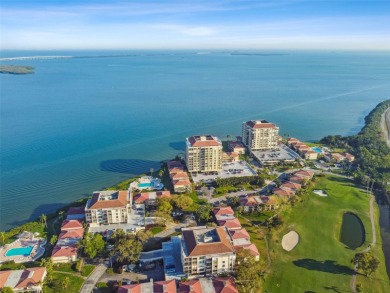 TURNKEY with GOLF & WATERFRONT VIEWS -- This beautifully on Isla Del Sol Yacht and Country Club in Florida - for sale on GolfHomes.com, golf home, golf lot