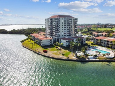 TURNKEY with GOLF & WATERFRONT VIEWS -- This beautifully on Isla Del Sol Yacht and Country Club in Florida - for sale on GolfHomes.com, golf home, golf lot