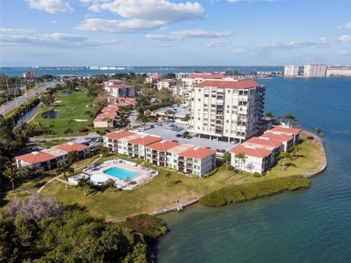 TURNKEY with GOLF & WATERFRONT VIEWS -- This beautifully on Isla Del Sol Yacht and Country Club in Florida - for sale on GolfHomes.com, golf home, golf lot