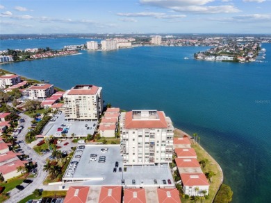 TURNKEY with GOLF & WATERFRONT VIEWS -- This beautifully on Isla Del Sol Yacht and Country Club in Florida - for sale on GolfHomes.com, golf home, golf lot