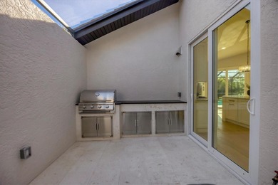 Welcome to 8033 Fairhaven Glen, a beautifully reimagined on University Park Country Club in Florida - for sale on GolfHomes.com, golf home, golf lot