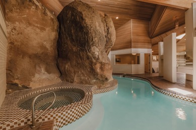 Set against the striking backdrop of the Bloomington Bluff on Bloomington Country Club in Utah - for sale on GolfHomes.com, golf home, golf lot