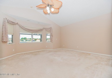 Waterfront Home with an Assumable Mortgage! Luxurious Living in on Slammer and Squire Golf Course in Florida - for sale on GolfHomes.com, golf home, golf lot