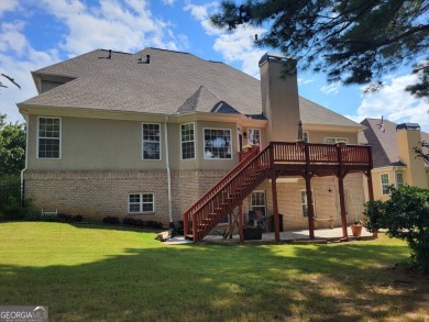 Stunning 7-Bedroom, 5-Bath All-Brick Home in Exclusive Gated on Eagles Landing Country Club in Georgia - for sale on GolfHomes.com, golf home, golf lot