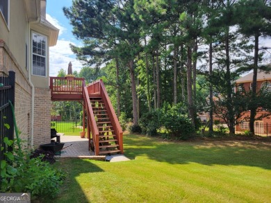 Stunning 7-Bedroom, 5-Bath All-Brick Home in Exclusive Gated on Eagles Landing Country Club in Georgia - for sale on GolfHomes.com, golf home, golf lot