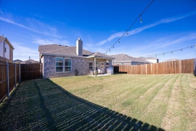 Located in Travis Ranch just minutes from Lake Ray Hubbard on Heath Golf and Yacht Club in Texas - for sale on GolfHomes.com, golf home, golf lot