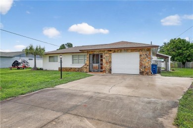 Welcome to this beautifully maintained 3-bedroom, 2-bathroom on San Carlos Golf Club in Florida - for sale on GolfHomes.com, golf home, golf lot