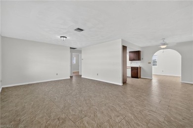 Welcome to this beautifully maintained 3-bedroom, 2-bathroom on San Carlos Golf Club in Florida - for sale on GolfHomes.com, golf home, golf lot
