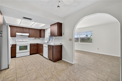 Welcome to this beautifully maintained 3-bedroom, 2-bathroom on San Carlos Golf Club in Florida - for sale on GolfHomes.com, golf home, golf lot