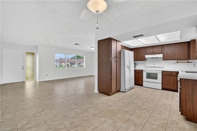 Welcome to this beautifully maintained 3-bedroom, 2-bathroom on San Carlos Golf Club in Florida - for sale on GolfHomes.com, golf home, golf lot